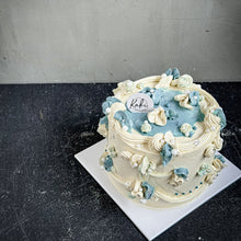 Load image into Gallery viewer, Elegant bespoke cakes from Kaki Desserts, featuring intricate designs and vibrant colors, displayed on a decorative table.