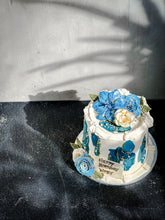 Load image into Gallery viewer, Bespoke cake by Kaki Desserts featuring intricate floral designs and vibrant colors on a smooth fondant finish.