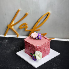 Load image into Gallery viewer, Custom bespoke cake by Kaki Desserts decorated with intricate floral designs and vibrant colors, displayed on a elegant stand.