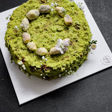 Load image into Gallery viewer, Elegant bespoke cake by Kaki Desserts, featuring intricate floral decorations and a smooth frosting finish.