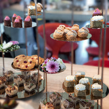 Load image into Gallery viewer, Bespoke cake by Kaki Desserts featuring intricate floral decorations and elegant design on a white background.