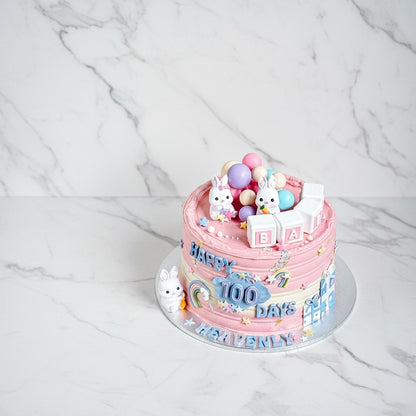 Marble 100-days bunny cake by Kaki Desserts featuring detailed bunny fondant decoration on elegant marble cake base.
