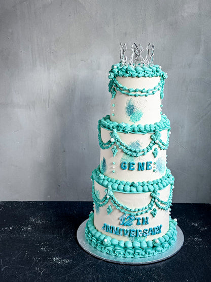 Elegant vintage tier cakes from Kaki Desserts with intricate frosting and decorative details, perfect for celebrations.