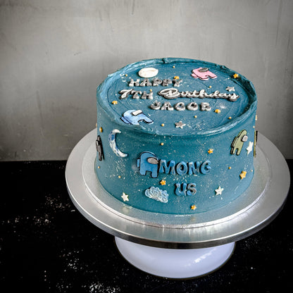 Decorative bespoke cake from Kaki Desserts with intricate frosting designs and colorful floral accents.