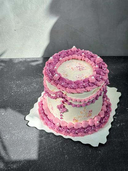Vintage Kaki Desserts cake with rich frosting and decorative toppings, displayed on a plate ready to serve.