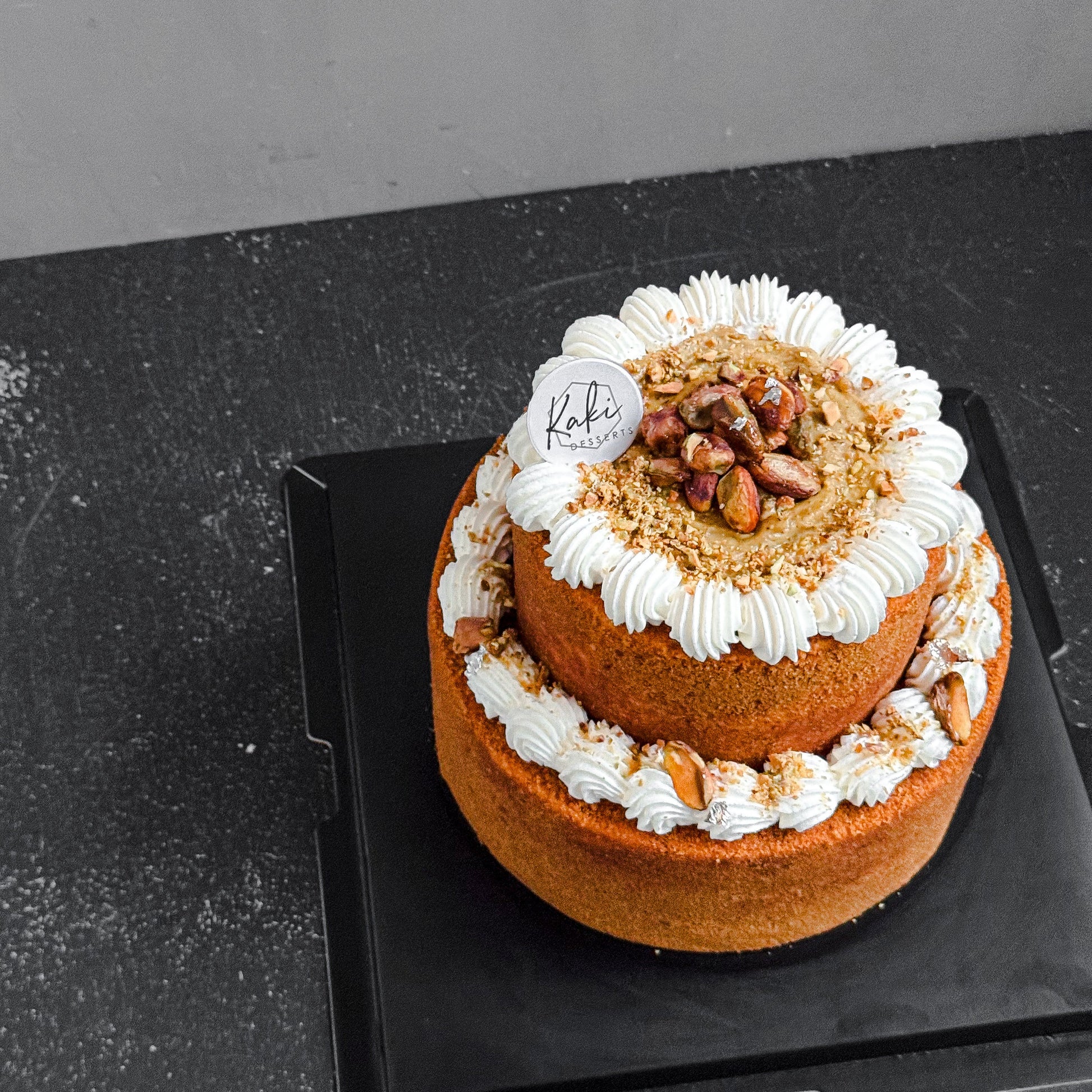 Refined sugar-free 2 tier pistachio honey cake from Kaki Desserts , with 100%pistachio paste and caramelize pistachio