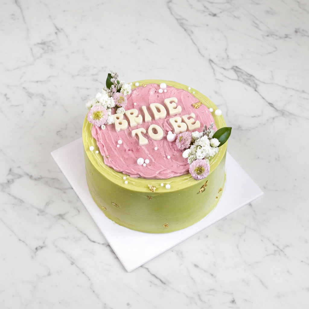 Bride-to-be full marble bespoke cake by Kaki Desserts, decorated with elegant marble frosting and intricate floral accents.
