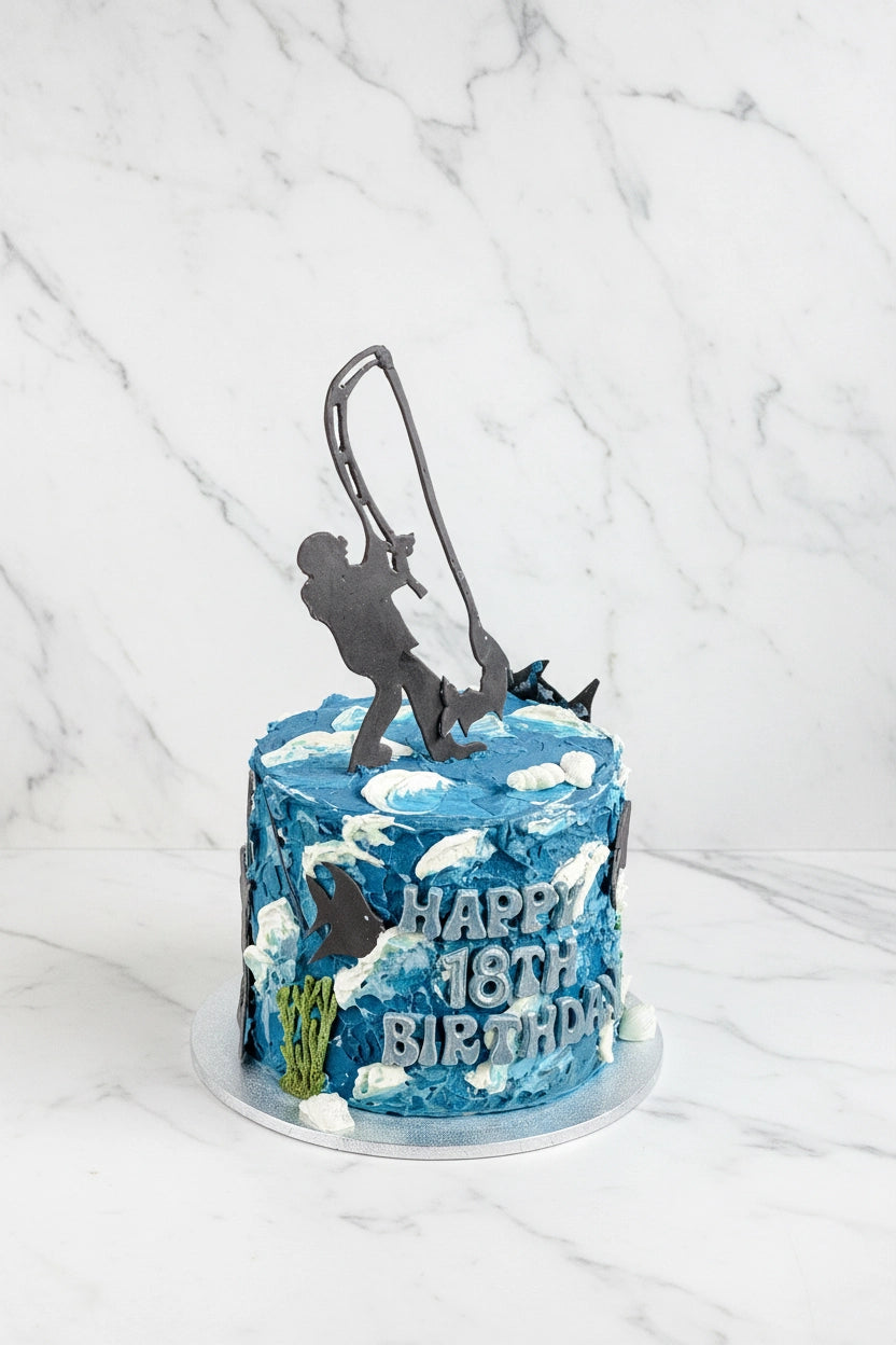 Marble fishing-themed cake from Kaki Desserts with intricate marbling design, perfect for special occasions and celebrations.
