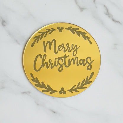 Gold Merry Christmas disc add-on from Kaki Desserts with a marble design, perfect for festive cake decorations.