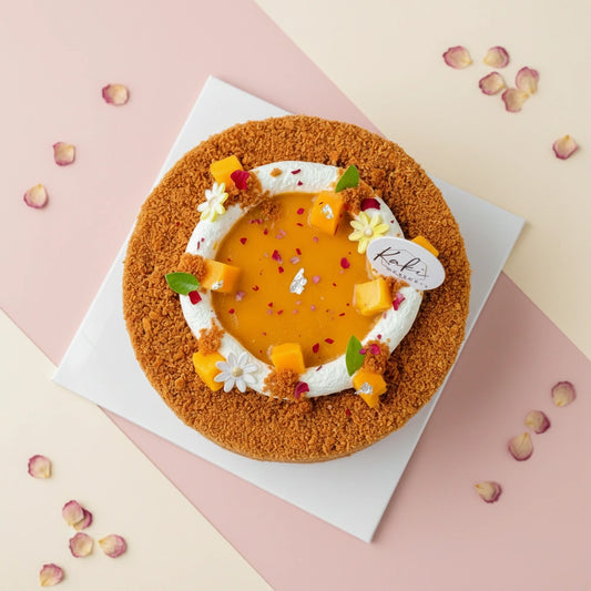 Elegant mango float cake from Kaki Desserts, featuring layered mango and creamy topping, perfect for special occasions like Mother’s Day.
