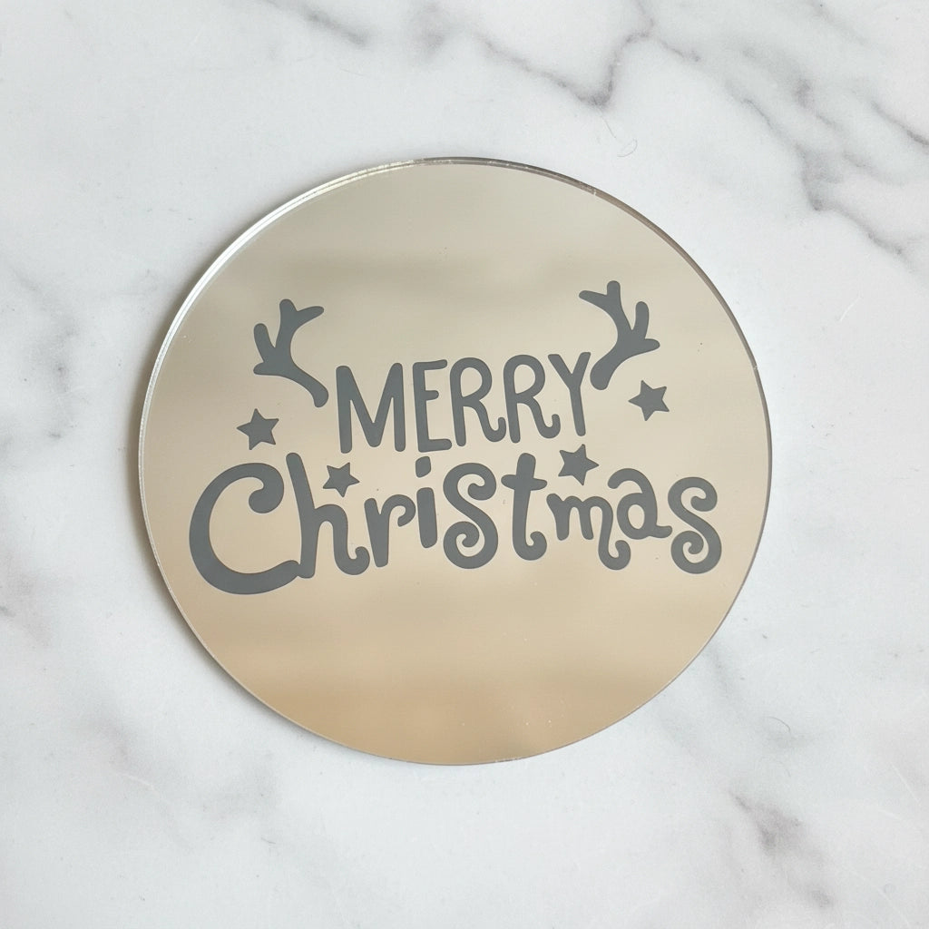 Silver Merry Christmas disc by Kaki Desserts with a marble design, ideal as a festive add-on decoration.
