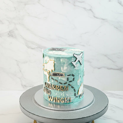 Marble travel cake from Kaki Desserts with elegant marble frosting and decorative toppings, perfect for special occasions.